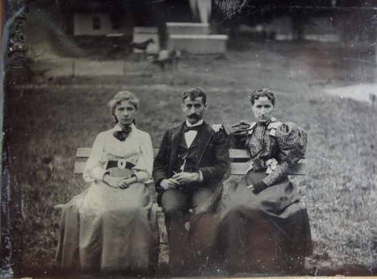 Family photographed outdoors